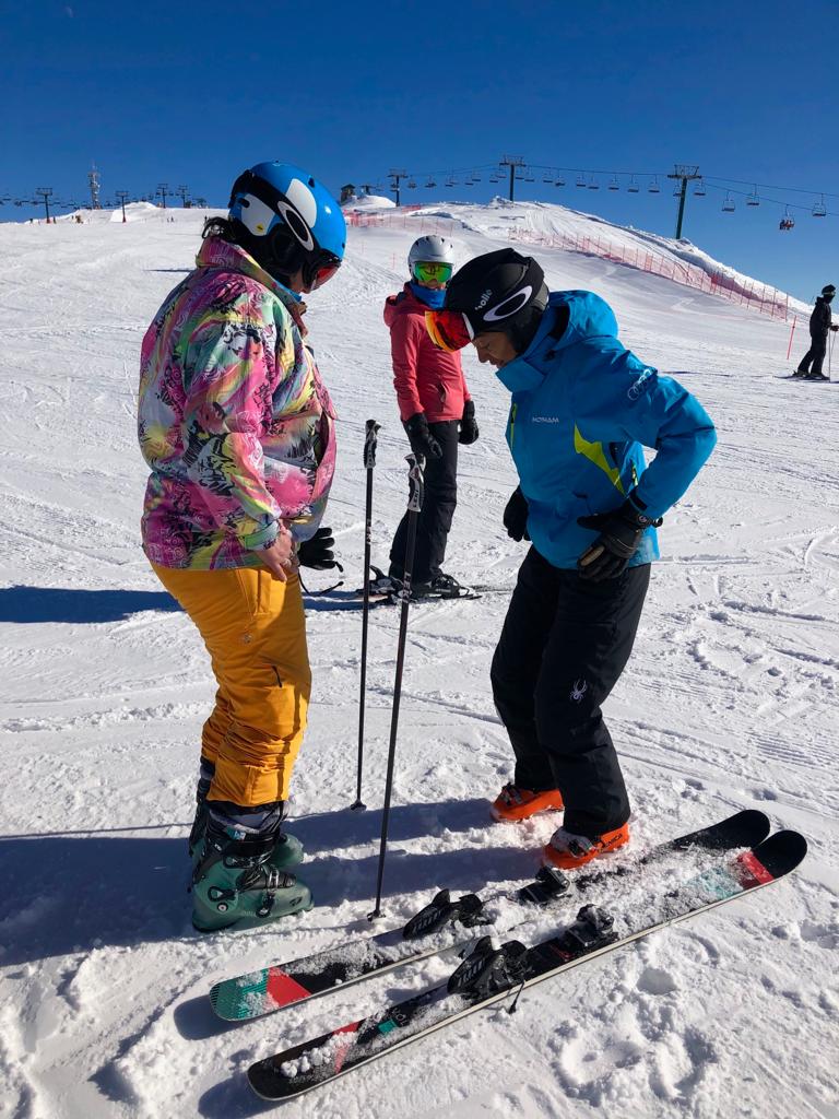 Nathalie instructing a female skier on a snowy slope at Mt hotham
